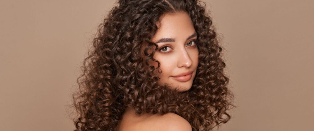 Timeless natural hairstyles including waves, bobs, and sleek ponytails styled at Dean Gera Salons Malta