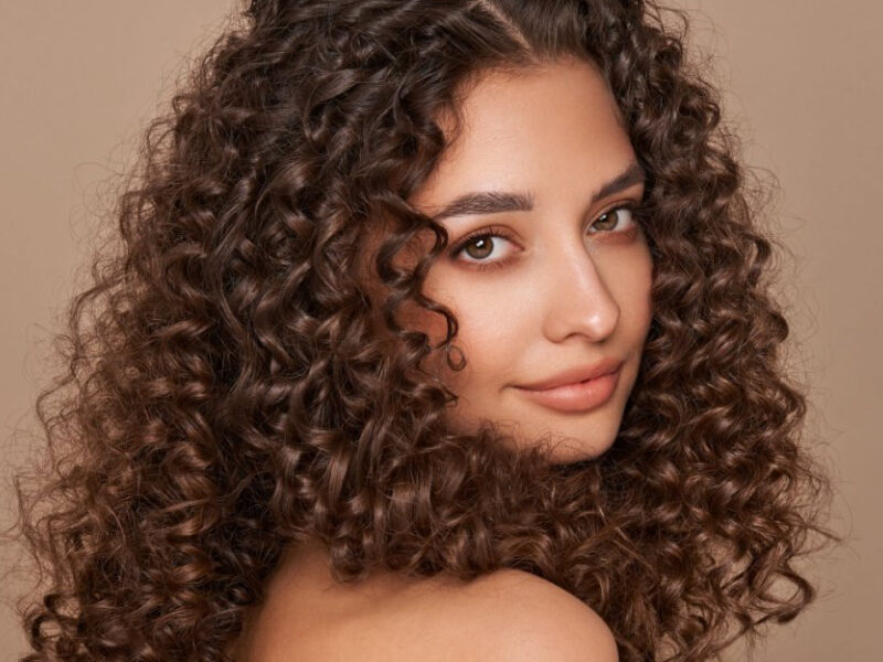 Timeless natural hairstyles including waves, bobs, and sleek ponytails styled at Dean Gera Salons Malta